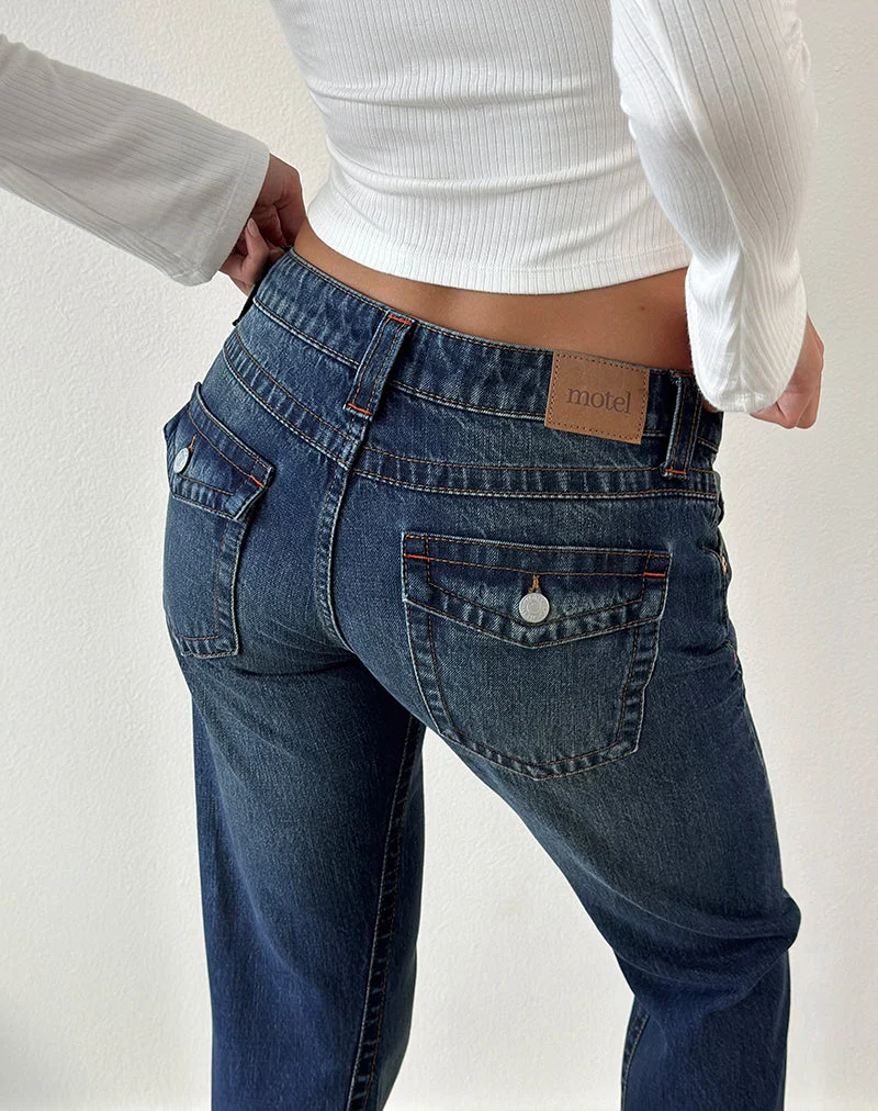 Jean taille très basse à coutures torsadées, teinte bleu moyen