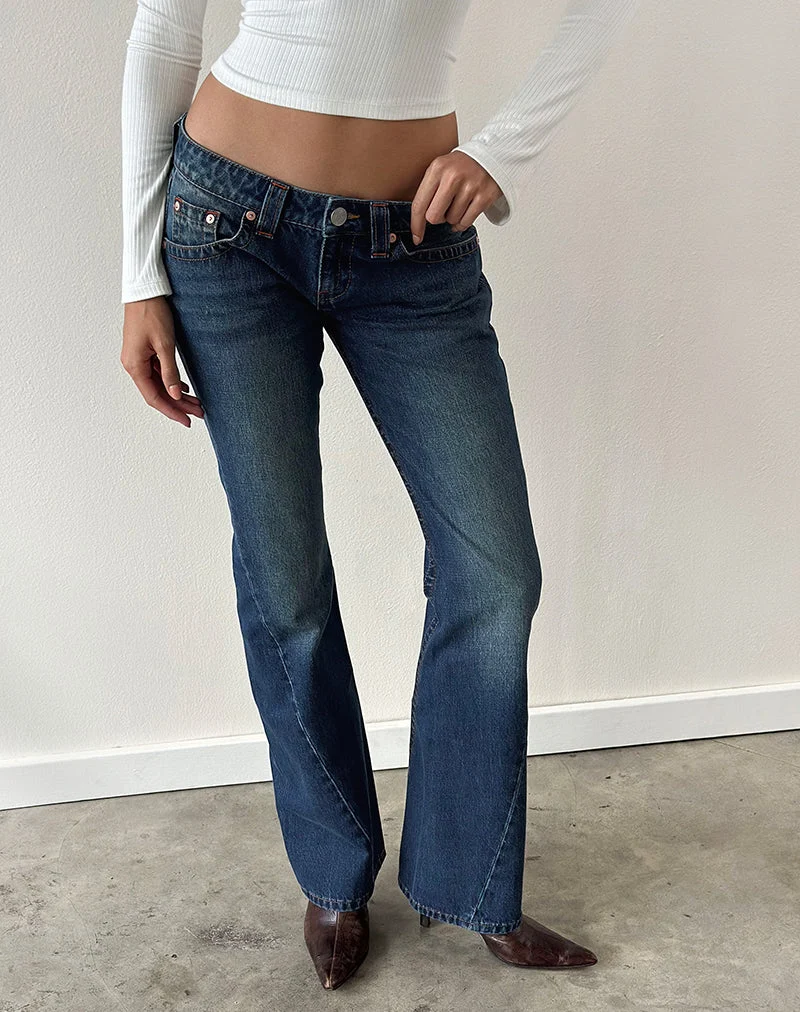 Jean taille très basse à coutures torsadées, teinte bleu moyen