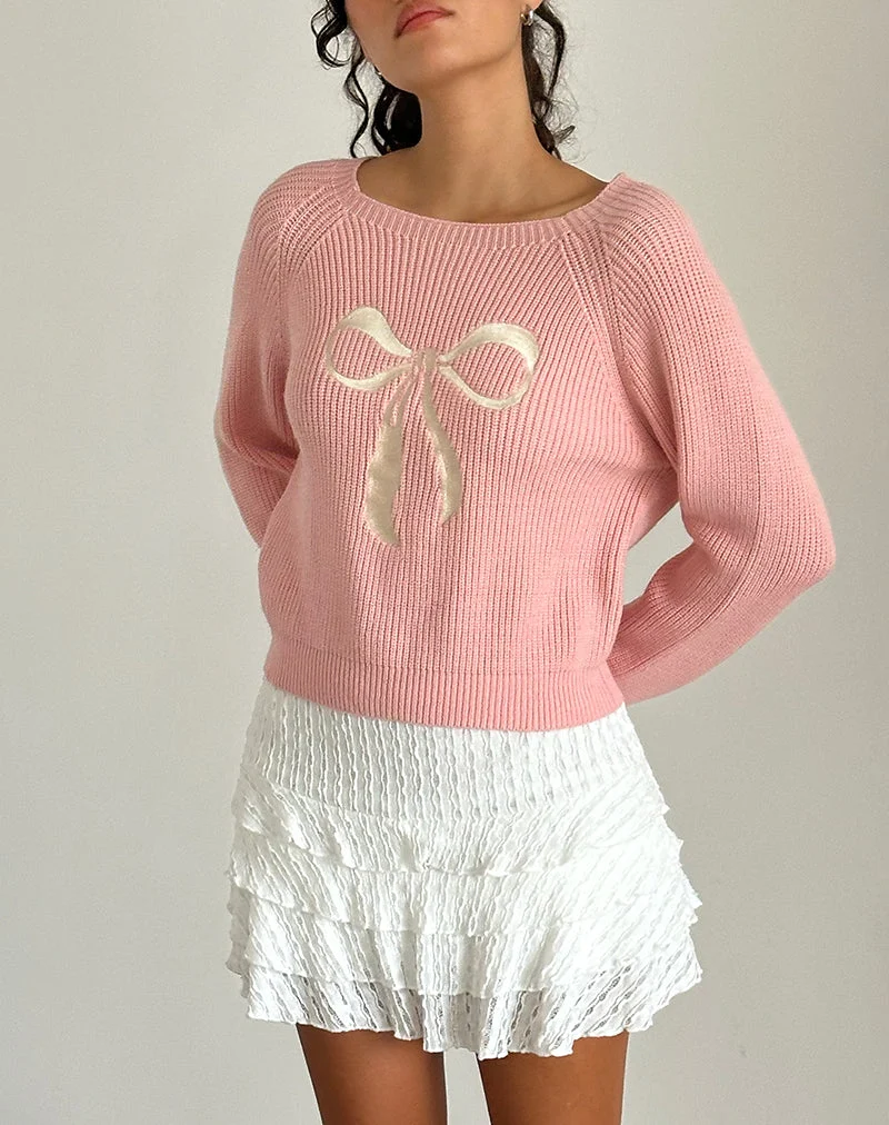 Pull Tami en tricot rose avec broderie de nœuds blancs