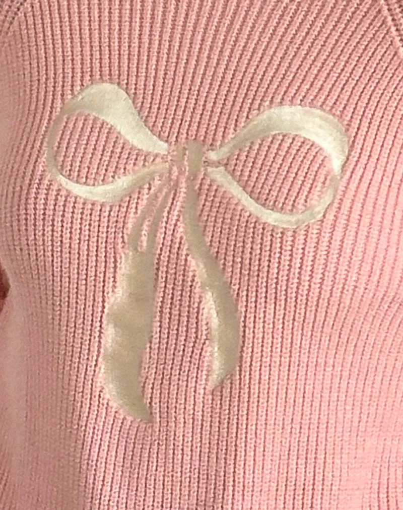 Pull Tami en tricot rose avec broderie de nœuds blancs