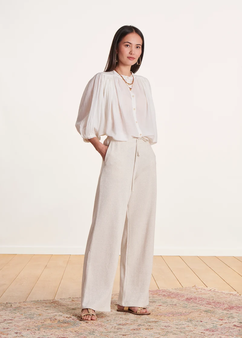 Pantalon large écru en maille à taille élastiquée