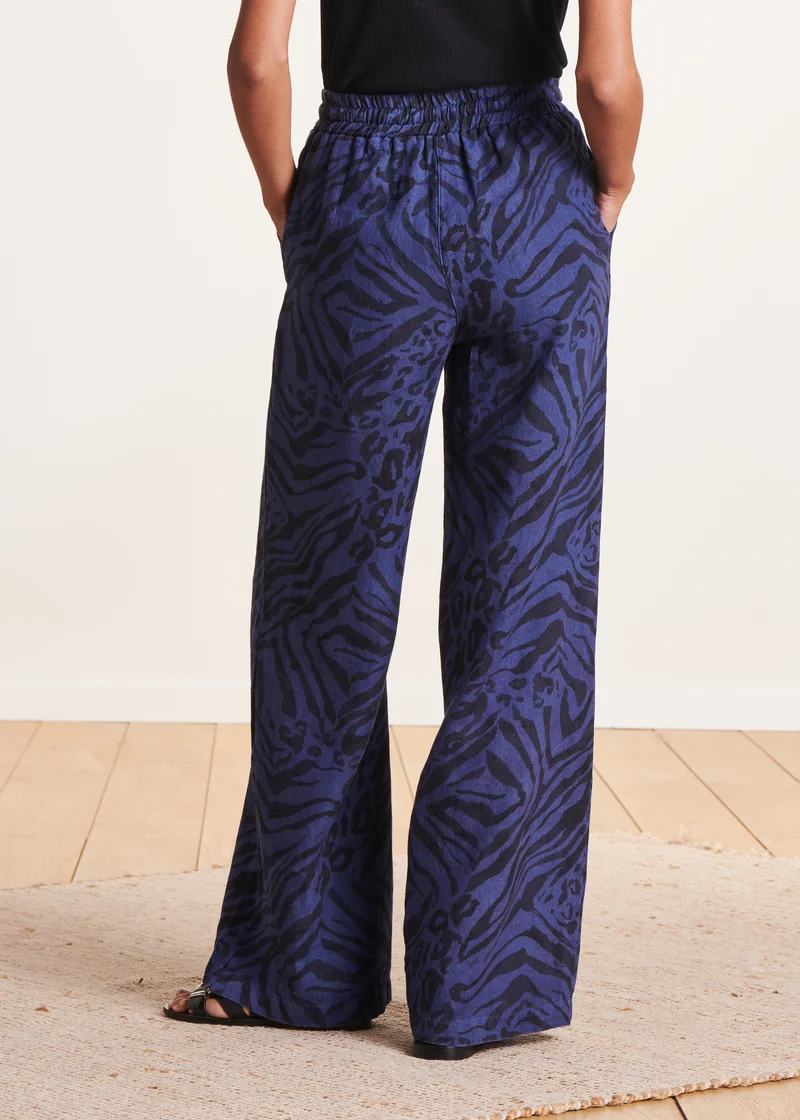 Pantalon large bleu en lin à imprimé animalier