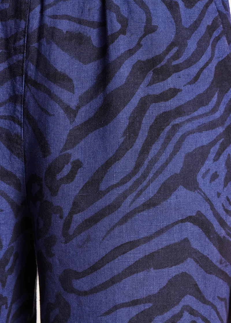 Pantalon large bleu en lin à imprimé animalier