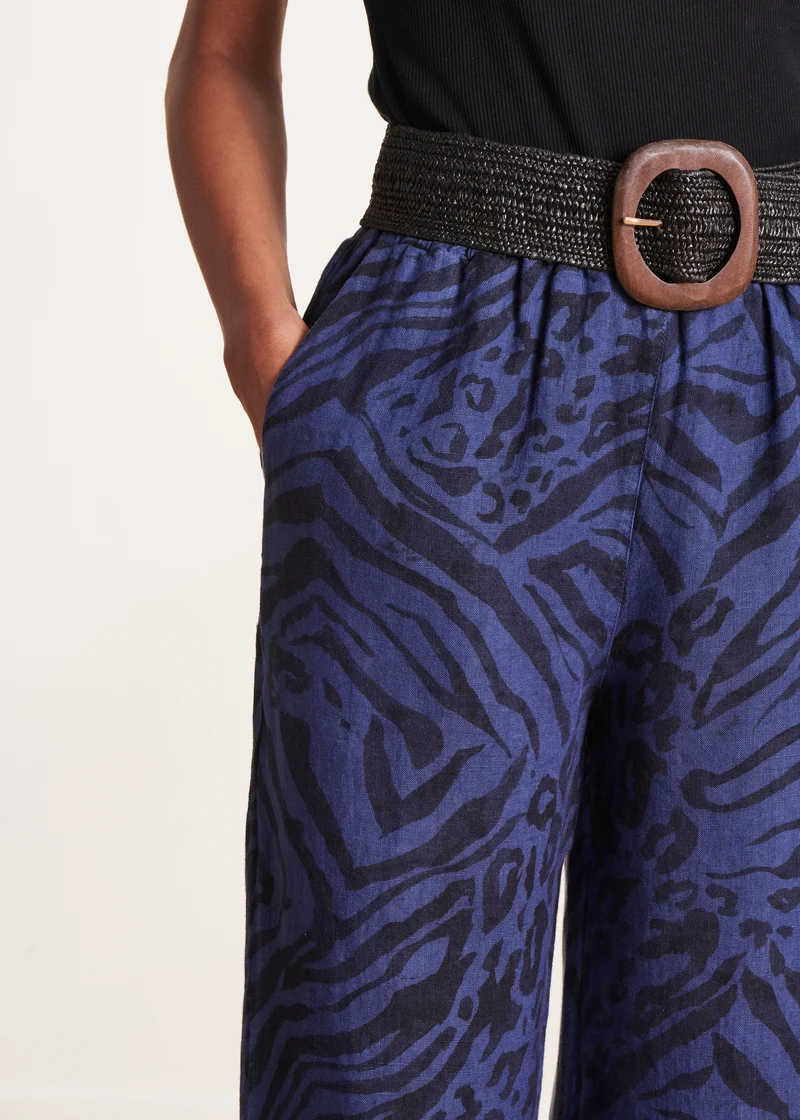 Pantalon large bleu en lin à imprimé animalier