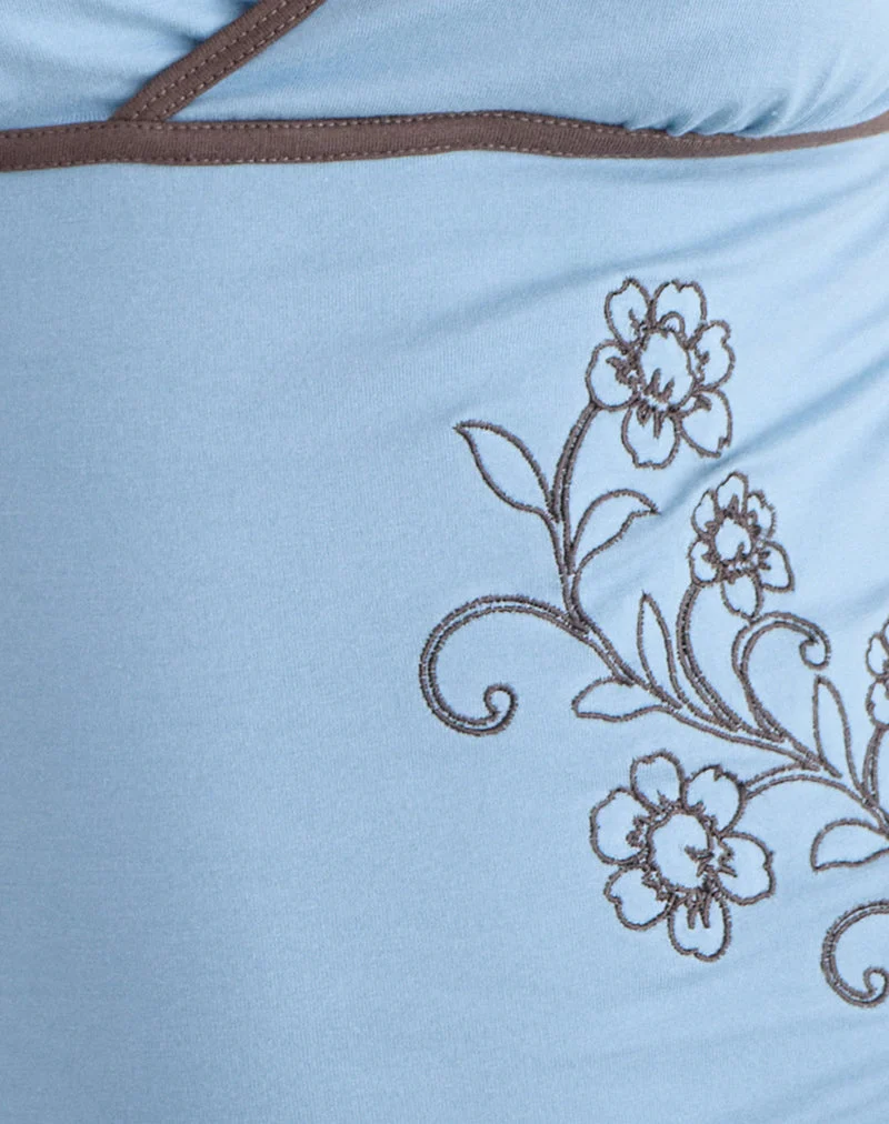 Haut Liuvia bleu Nantucket avec bordure en quartz café et broderie florale