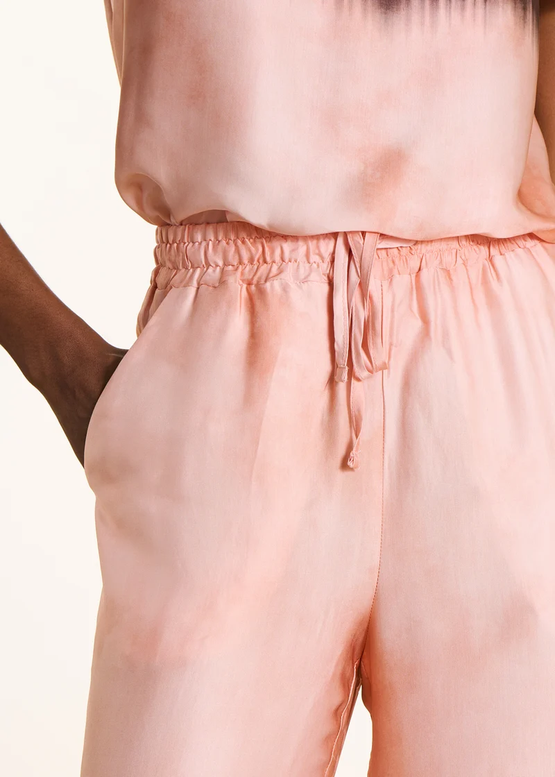 Pantalon large rose en satin imprimé tie & dye
