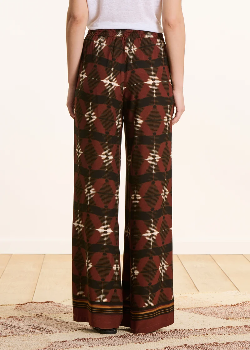 Pantalon large marron taille haute à imprimé