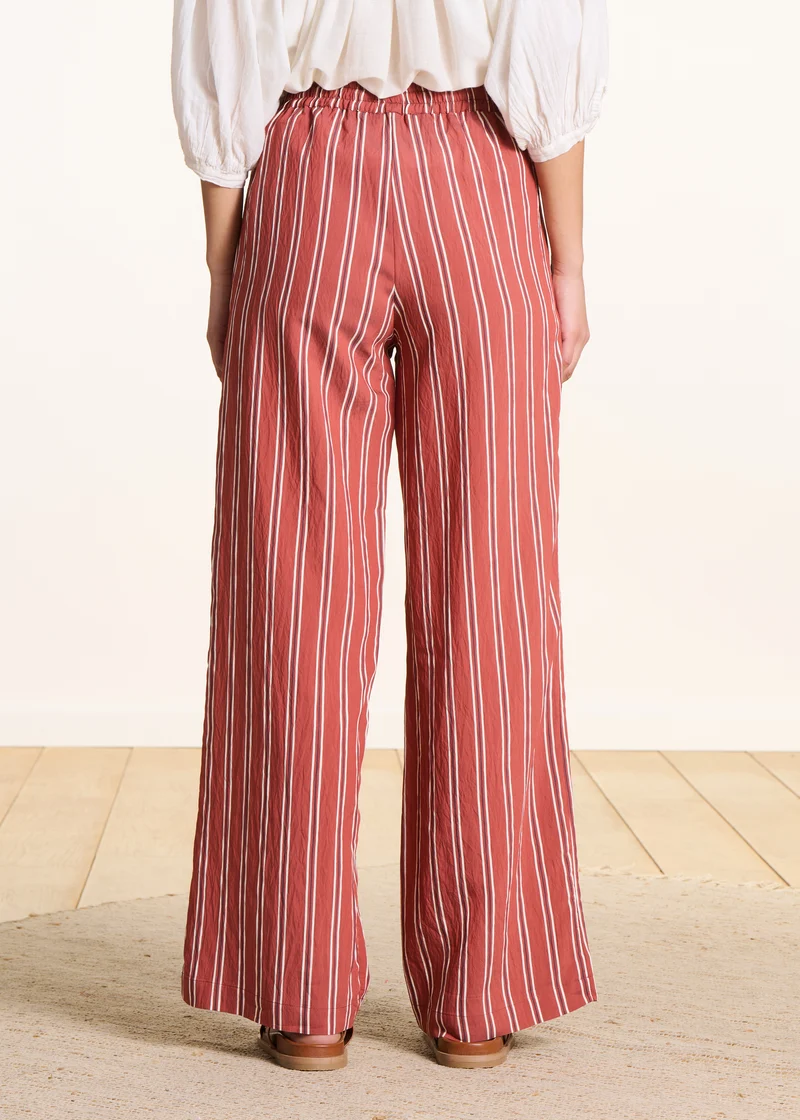 Pantalon large rouge rayé
