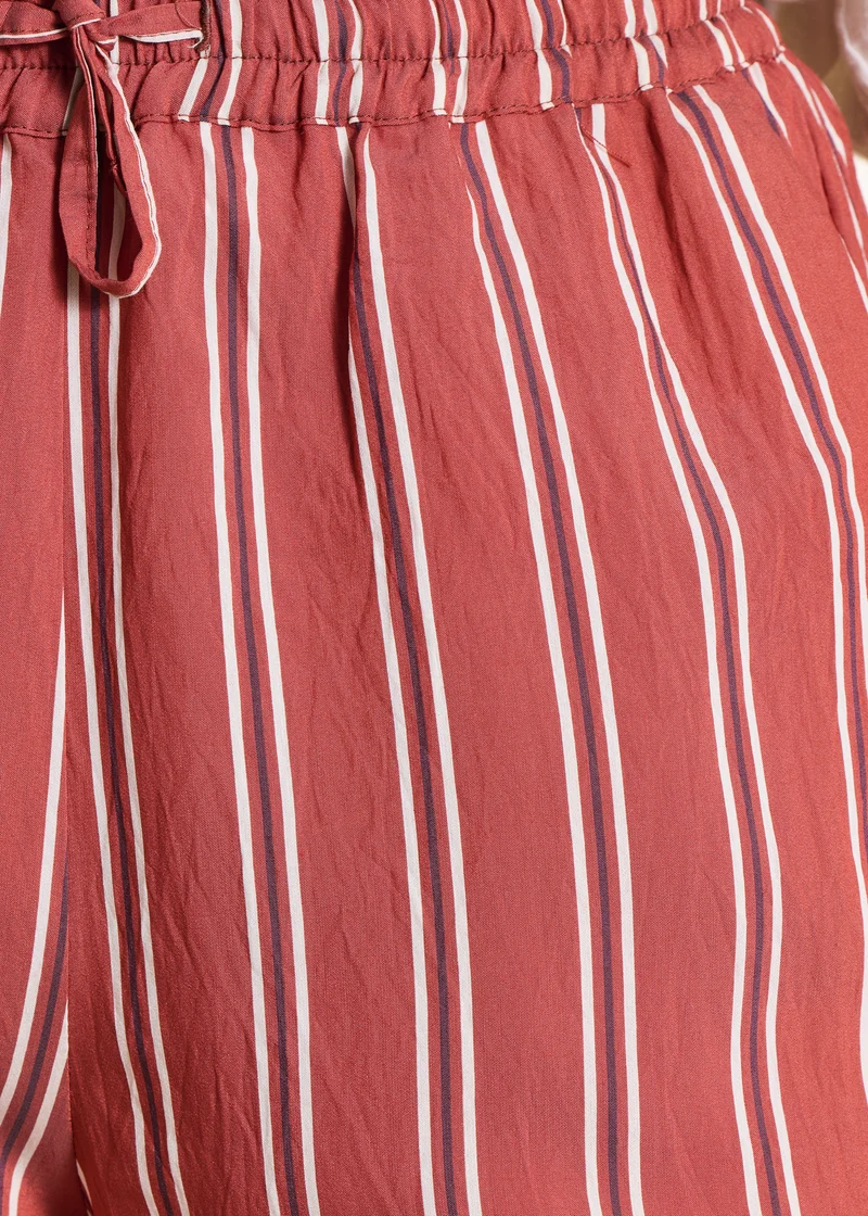 Pantalon large rouge rayé