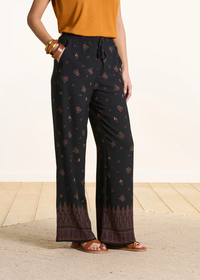 Pantalon large noir à imprimé
