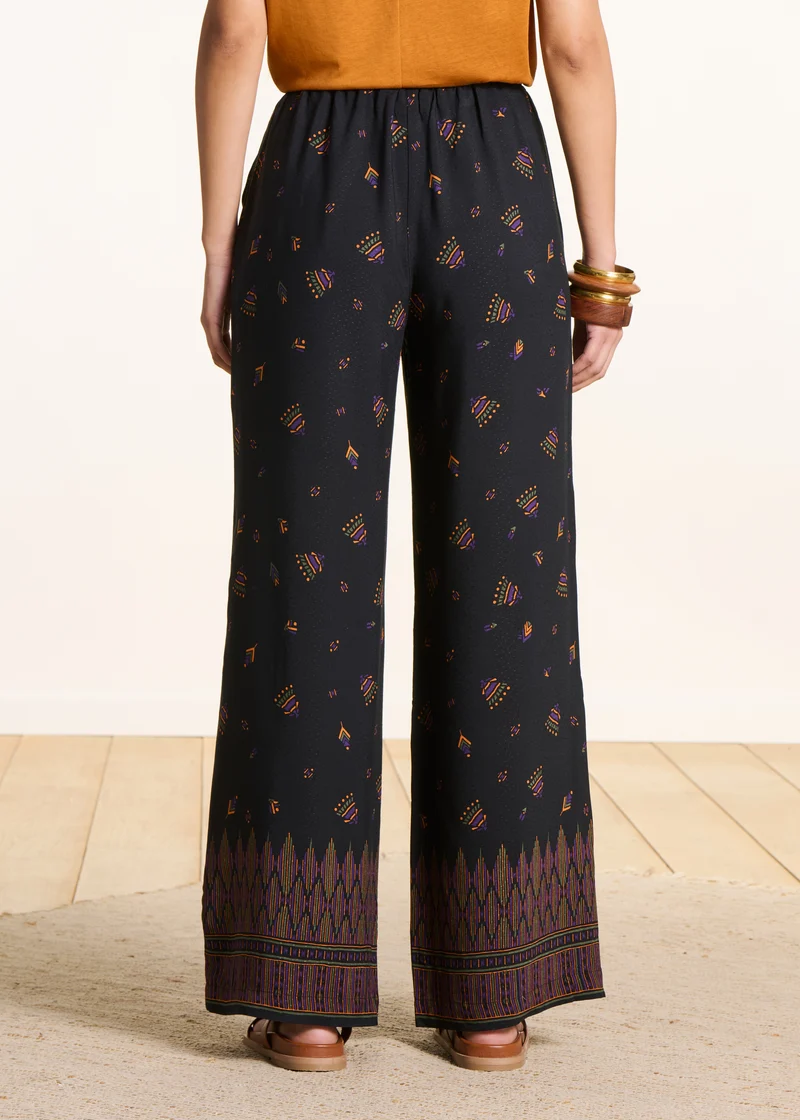 Pantalon large noir à imprimé