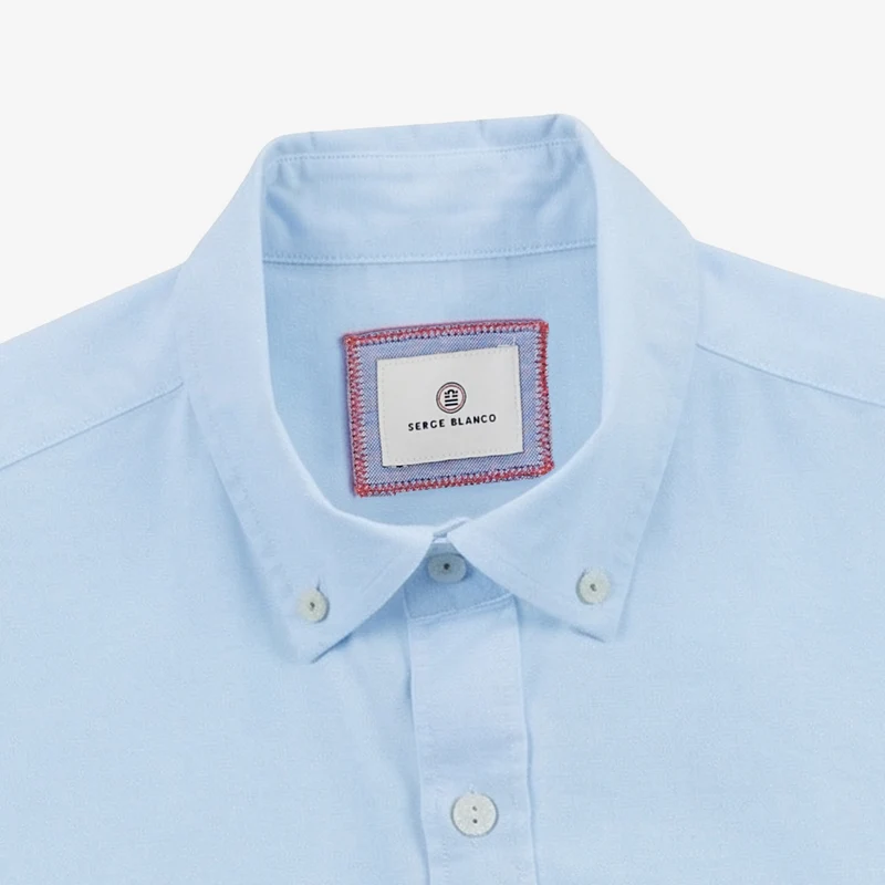 Chemise manches longues en coton oxford bleu ciel avec ganse tricolore