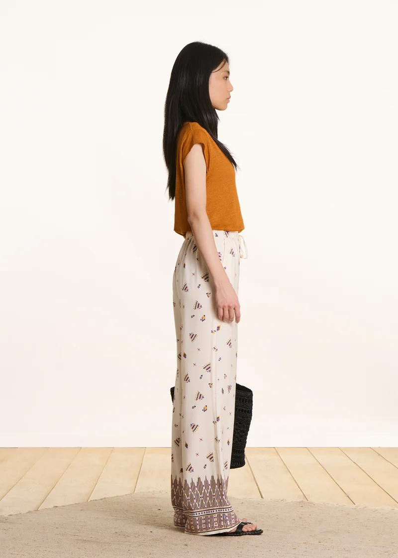 Pantalon large écru à imprimé