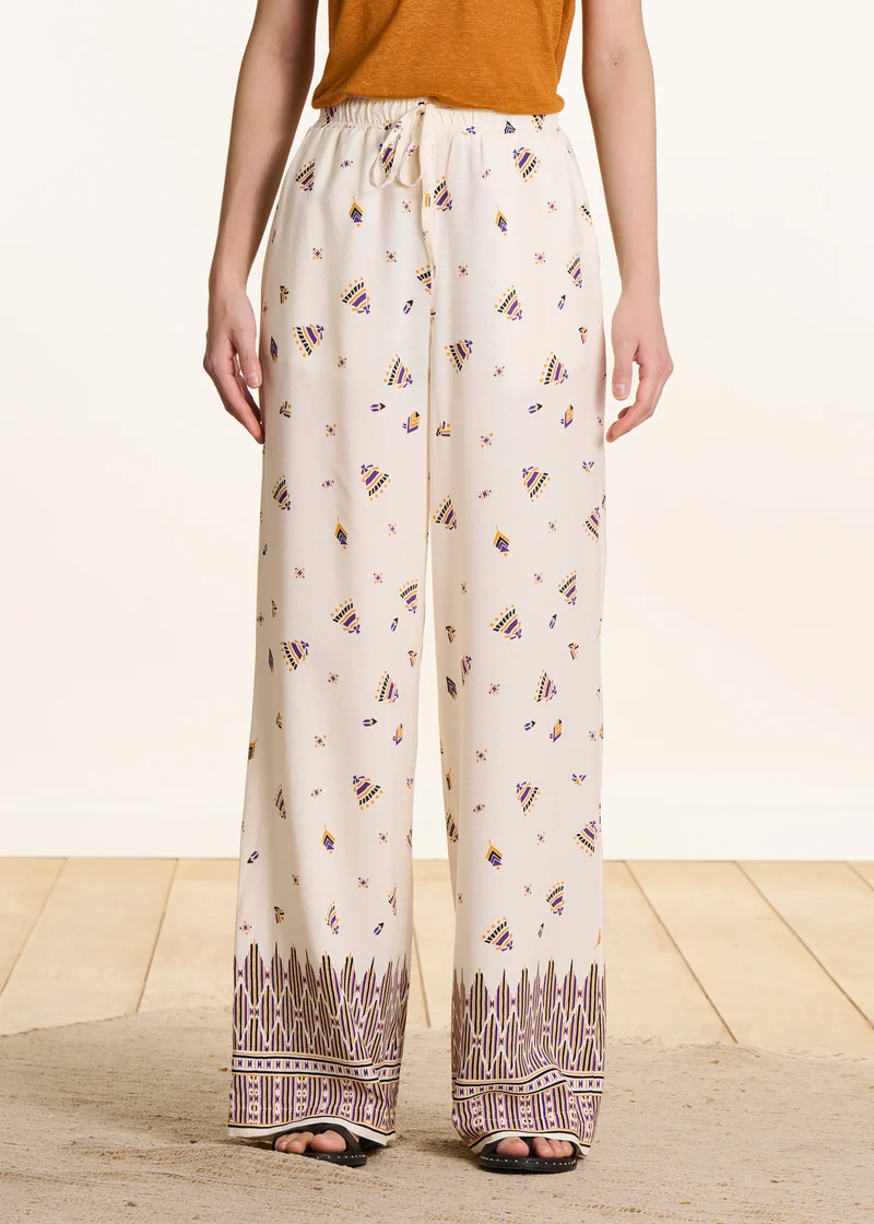 Pantalon large écru à imprimé