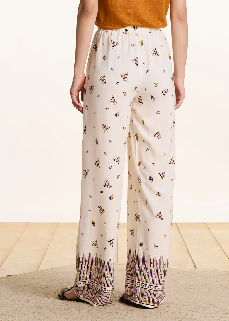 Pantalon large écru à imprimé