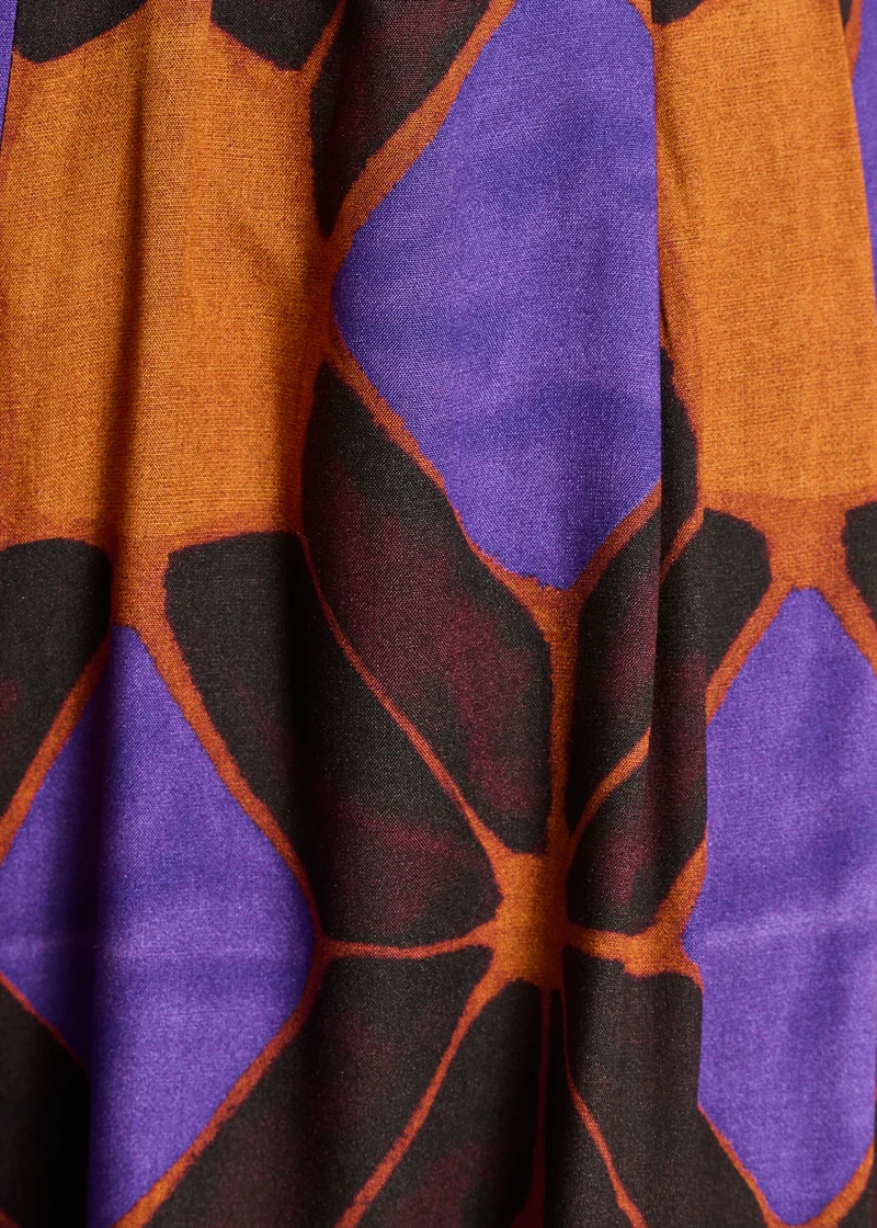 Pantalon large orange et violet à imprimé