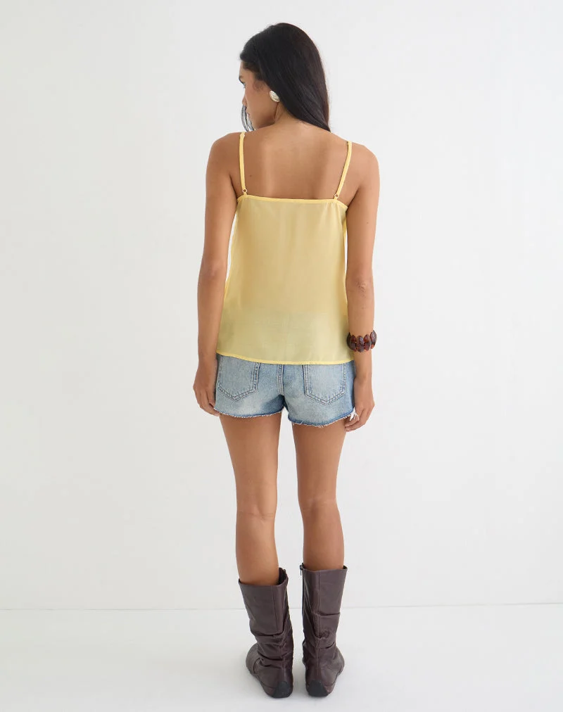 Haut Sena en mousseline jaune pastel