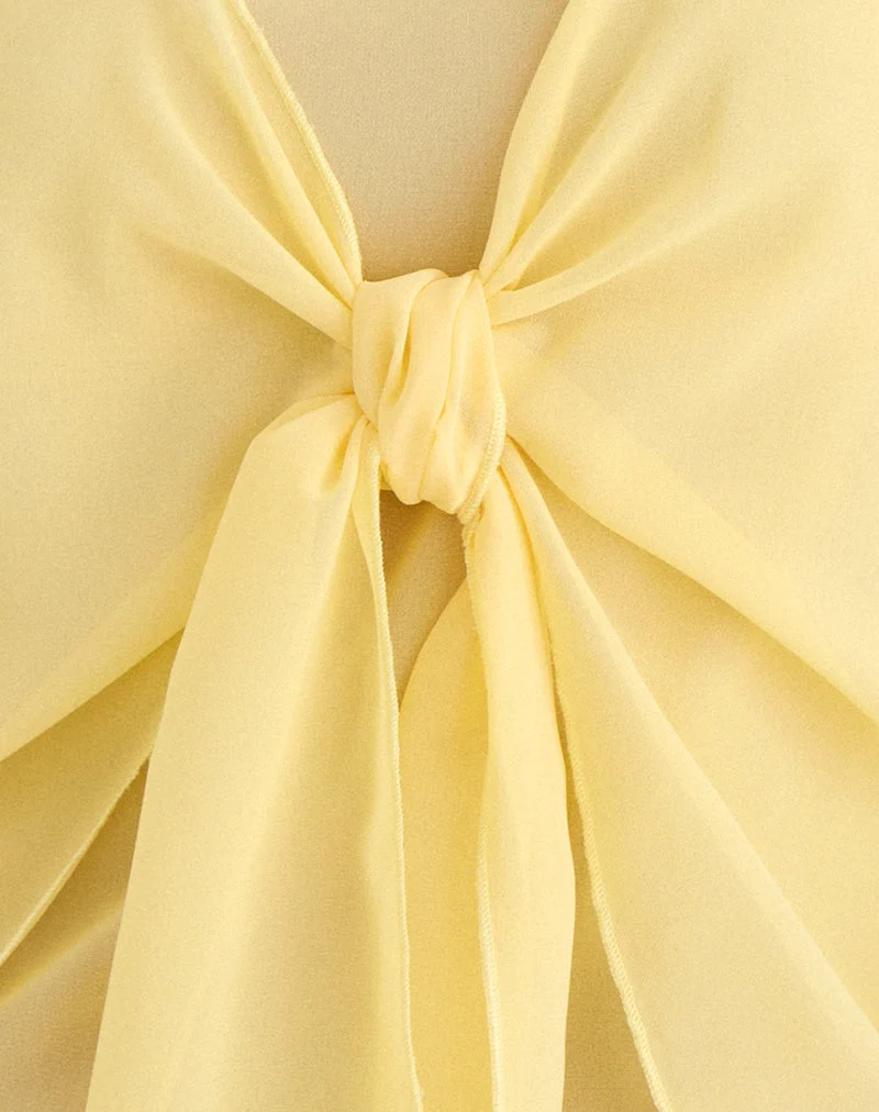 Haut Sena en mousseline jaune pastel