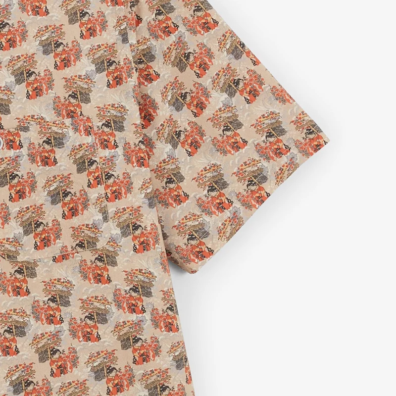 Chemise manches courtes beige avec imprimés personnage