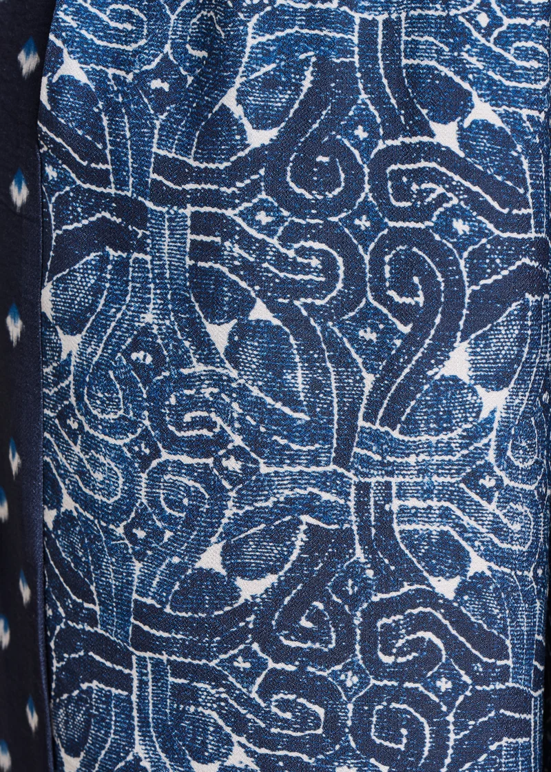 Pantalon large bleu patchwork imprimés