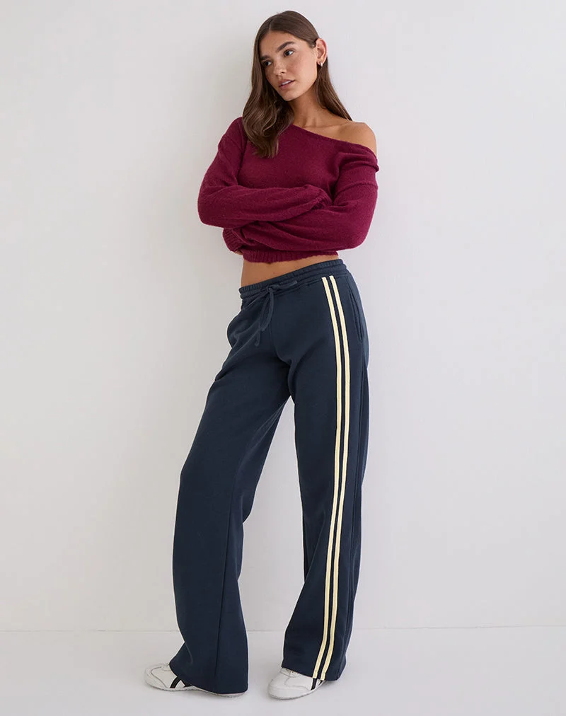 Jogging Covero bleu marine avec bordure couleur beurre