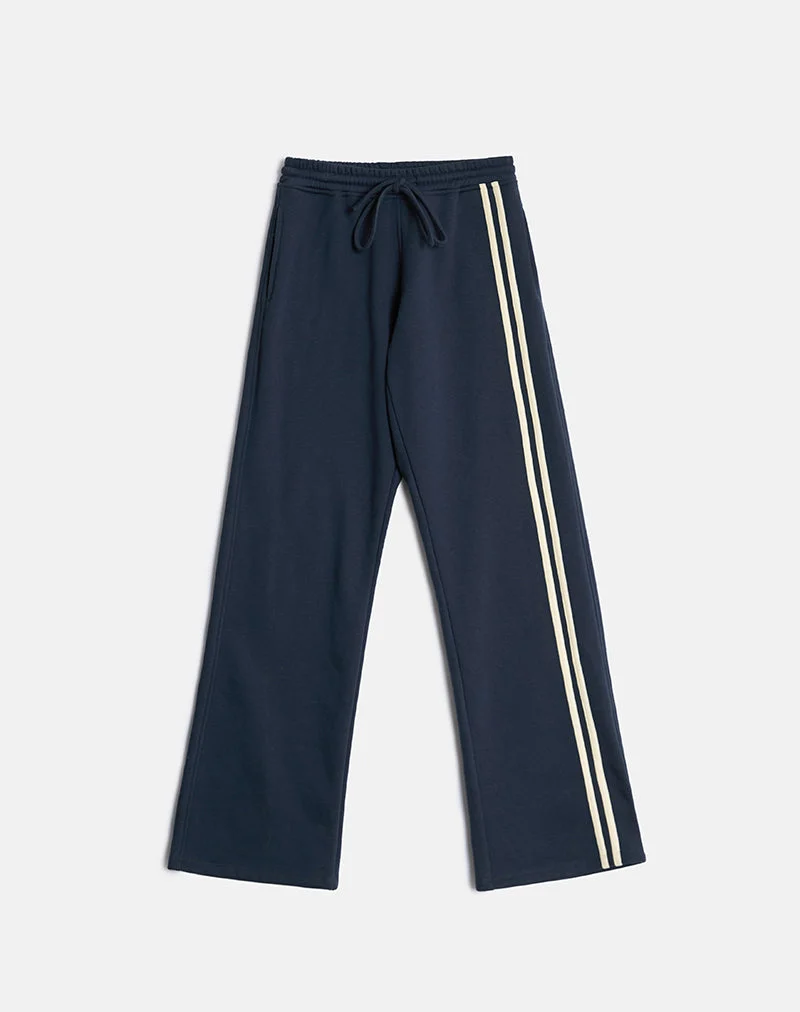 Jogging Covero bleu marine avec bordure couleur beurre