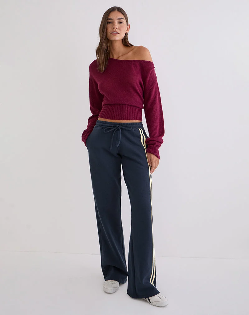 Jogging Covero bleu marine avec bordure couleur beurre