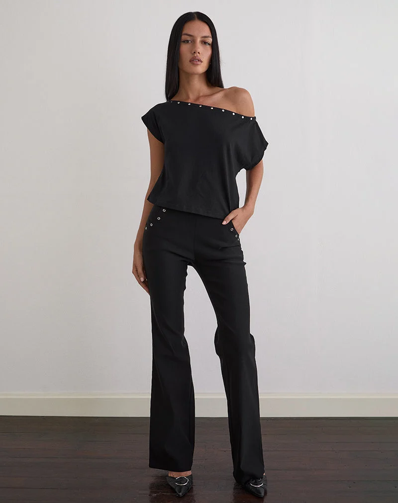 Top Bizzy en jersey noir avec clous