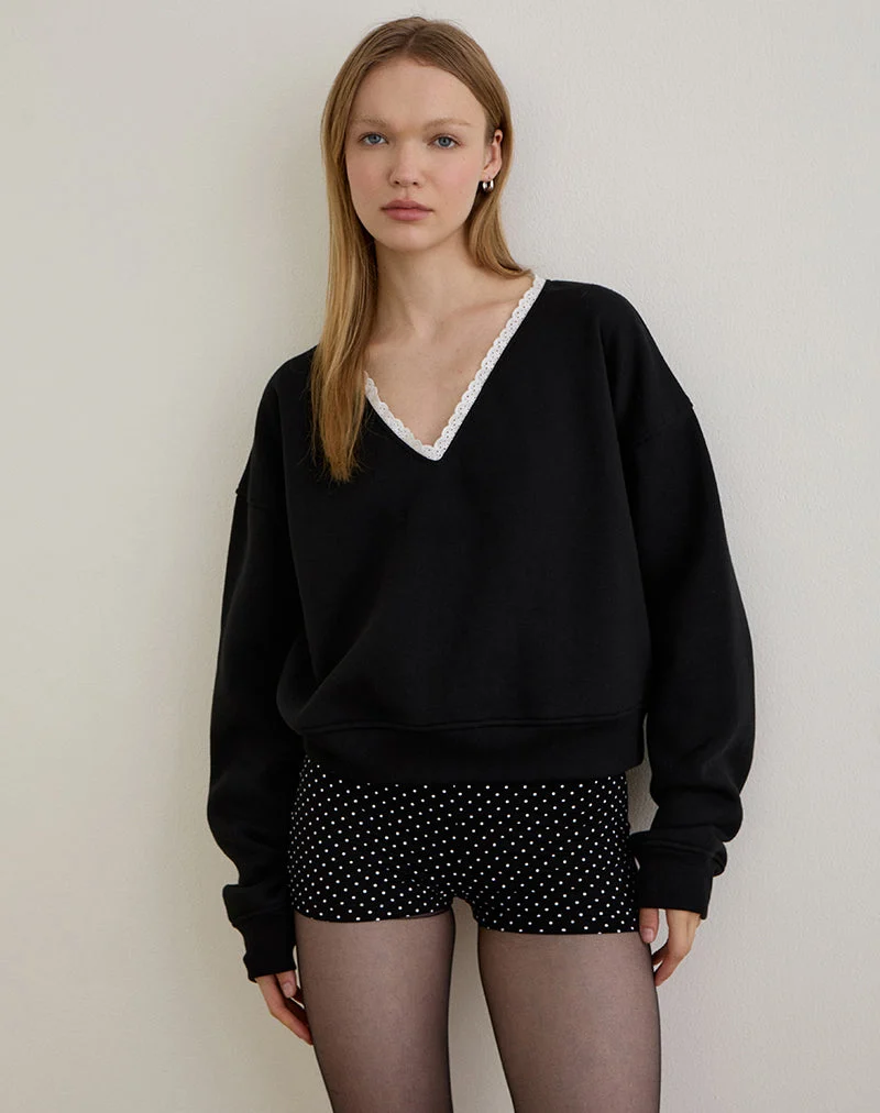 Pull Rodyn en noir avec des pointillés blancs