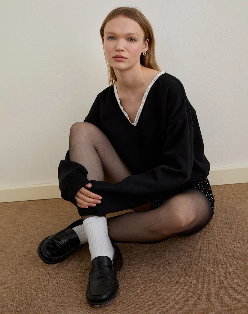 Pull Rodyn en noir avec des pointillés blancs