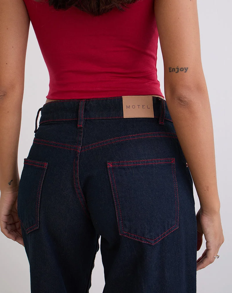 Jean spacieux à taille basse en indigo avec surpiqûres rouges