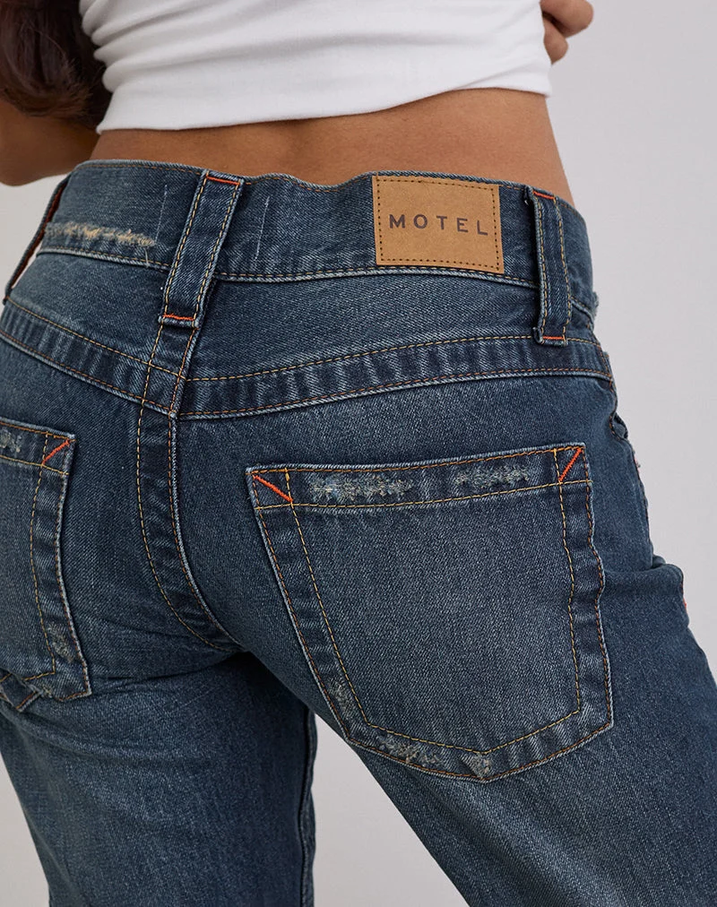 Jean taille basse à coutures torsadées, coloris bleu moyen