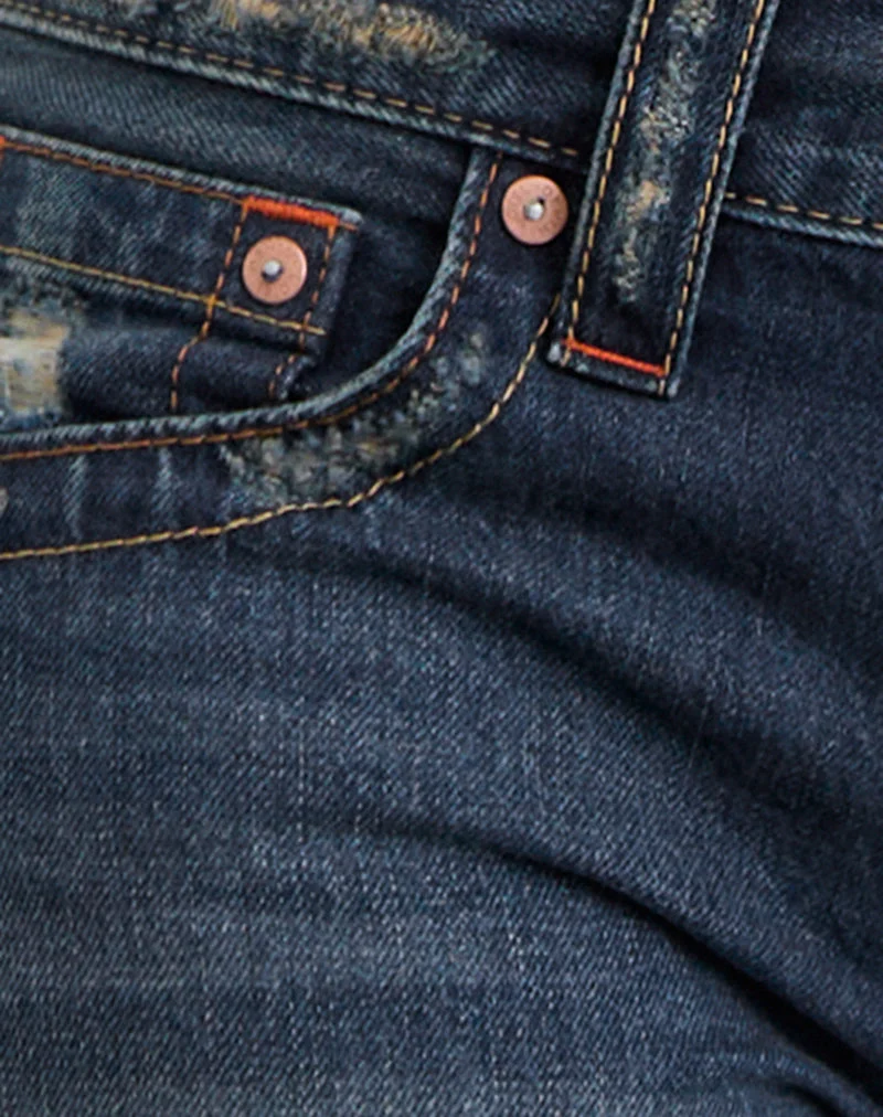 Jean taille basse à coutures torsadées, coloris bleu moyen