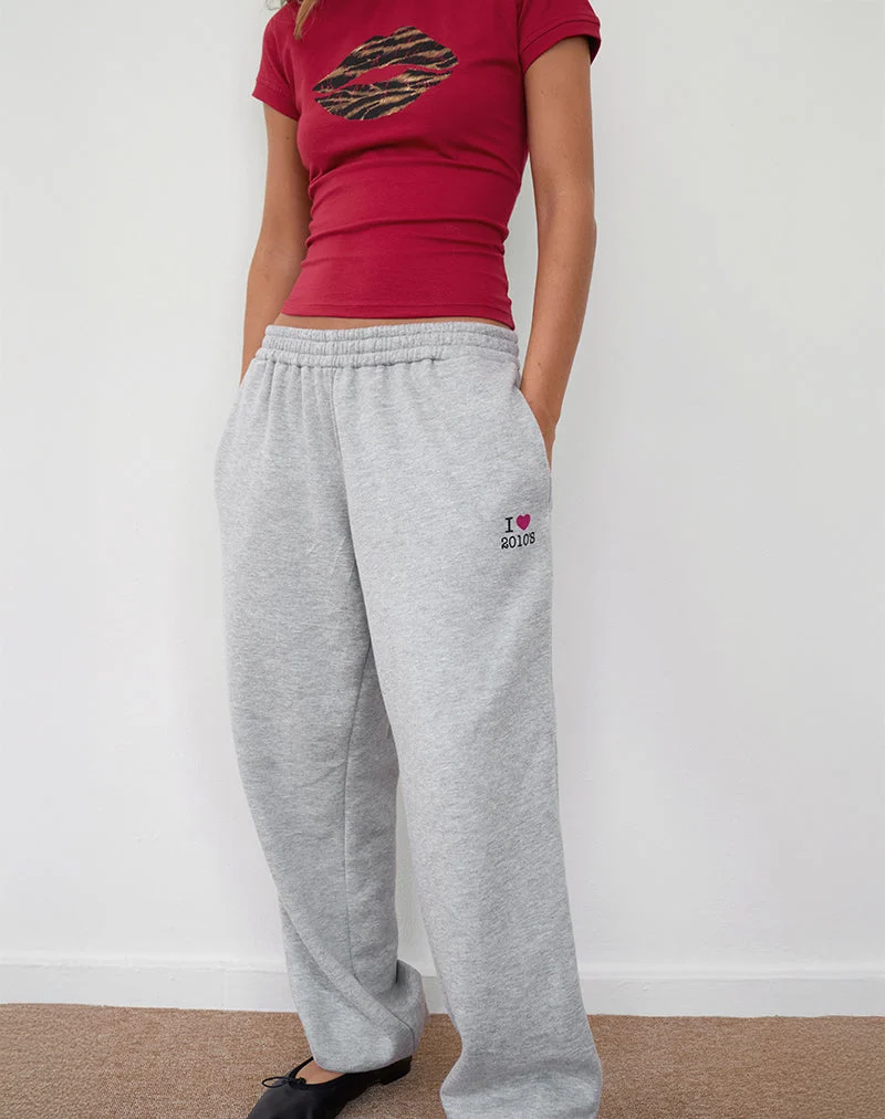Pantalon de jogging surdimensionné Emiko en gris chiné avec imprimé I Love 2010's