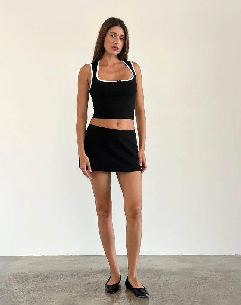 Shinju Top en noir avec reliure blanche