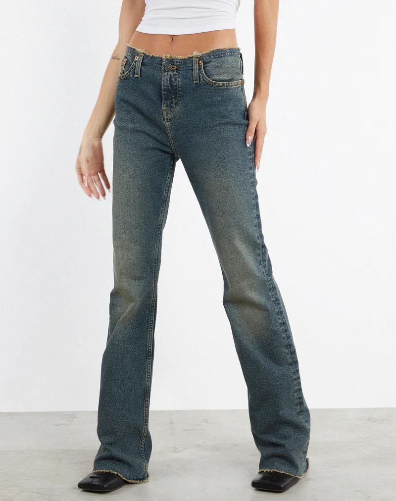 Jean à taille basse effiloché en brun et bleu acidulé
