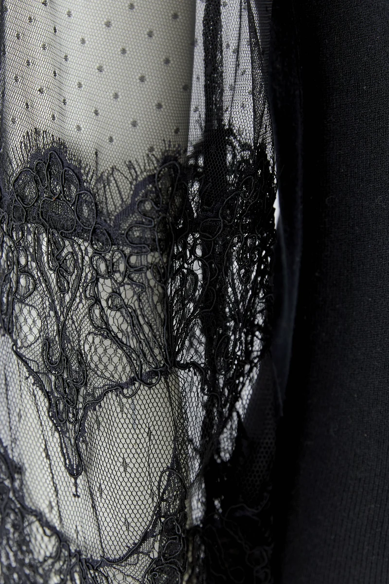 Haut à manches transparentes et col montant