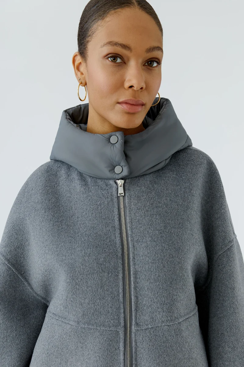 Manteau ample à capuchon matelassé