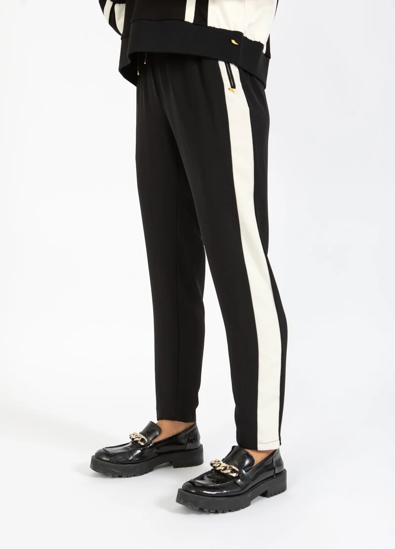 Jogging style sportif avec bandes latérales