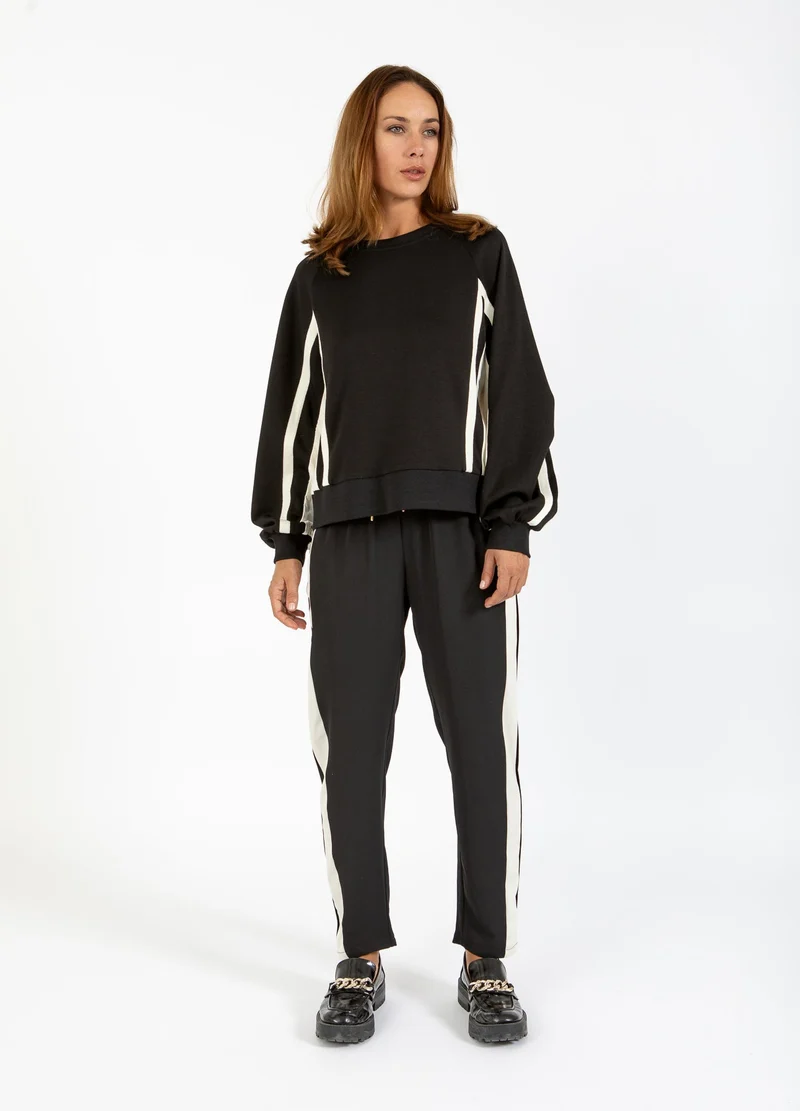 Jogging style sportif avec bandes latérales