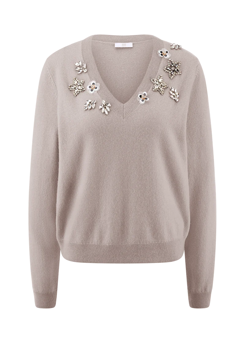 Pull à col V avec détails floraux
