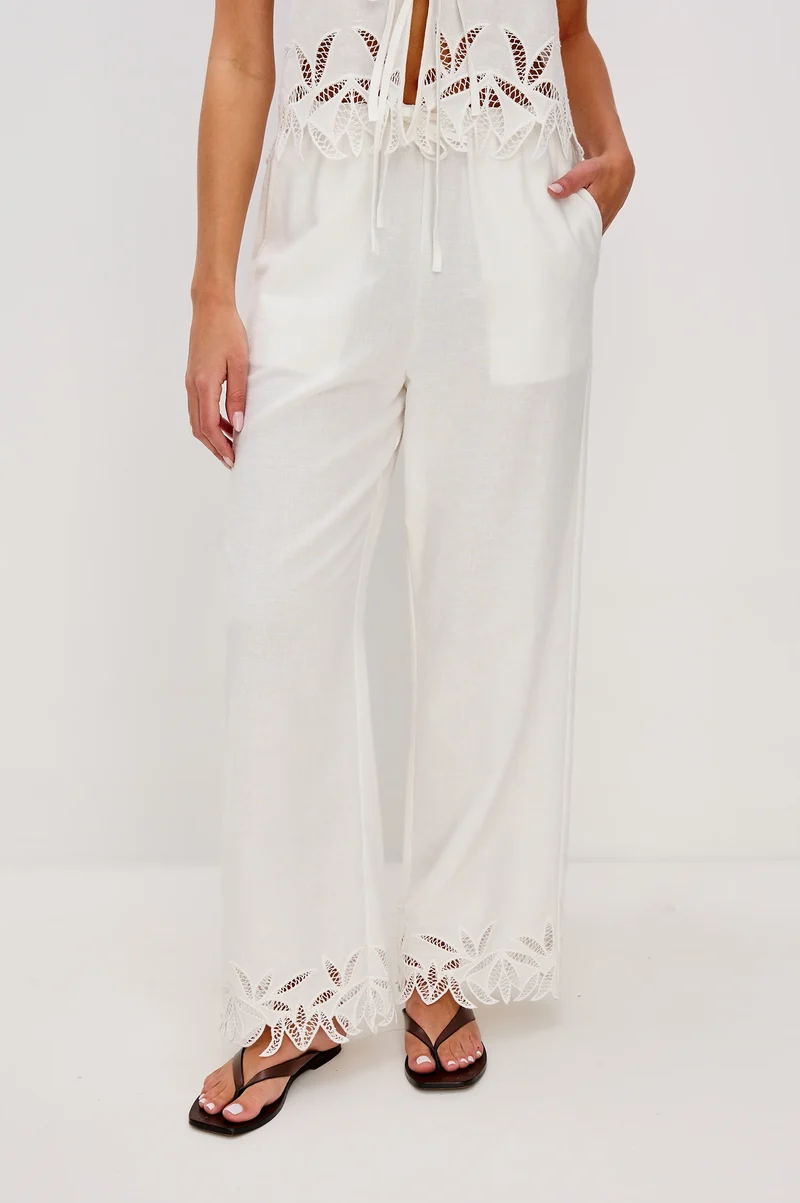 Pantalon en lin Emmie à broderies palmiers