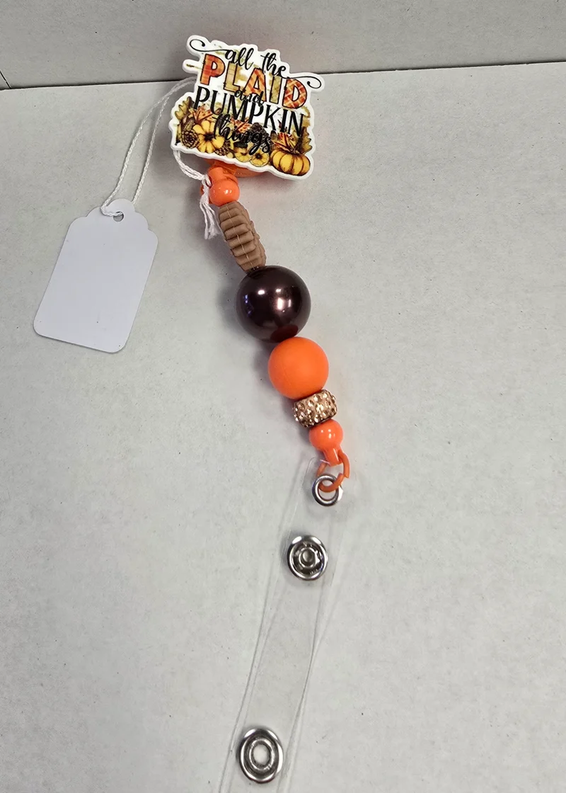 1042 His Spirit Creations Plaid Pumpkin Badge Reel