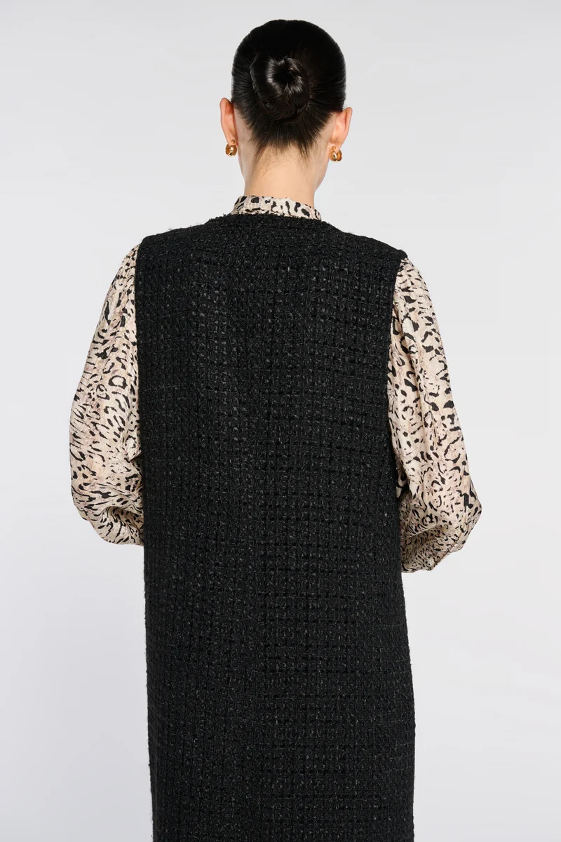 Veste longue sans manche en tweed