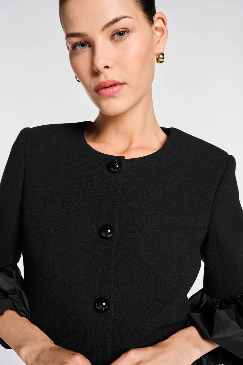 Veste à manches bouffantes