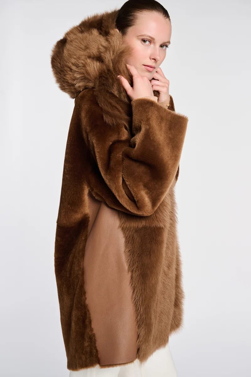 Manteau bi-matière en fourrure
