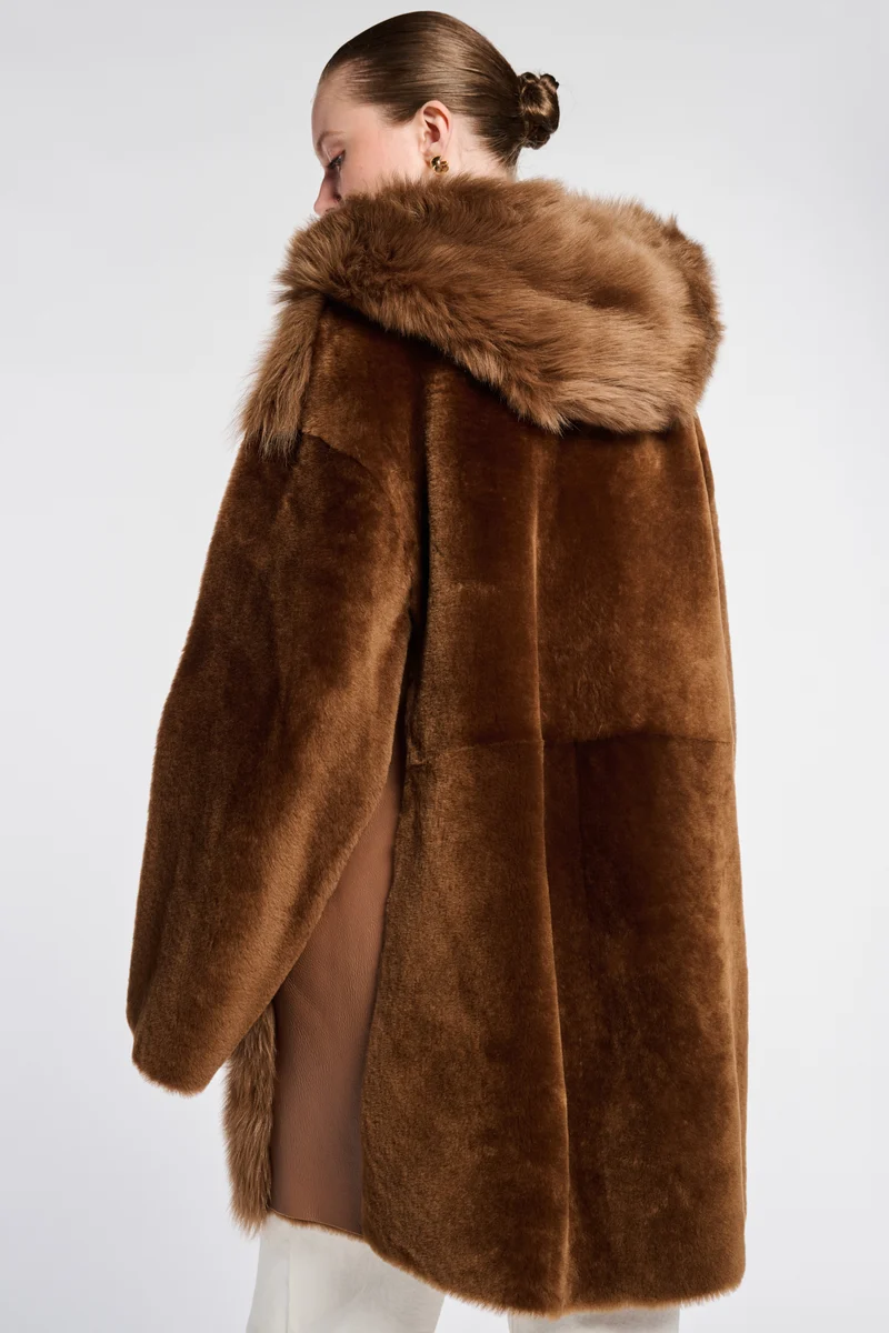 Manteau bi-matière en fourrure