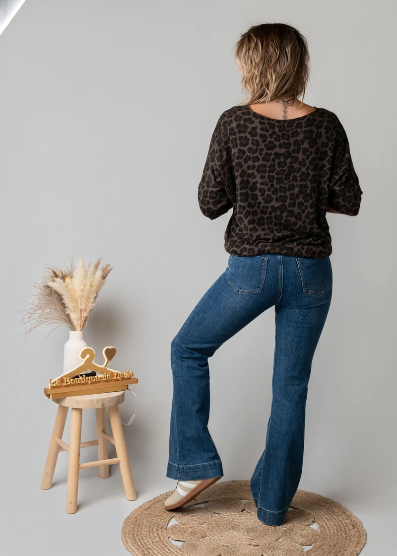 Jean flare bleu brut bas large surpiqué Cléo