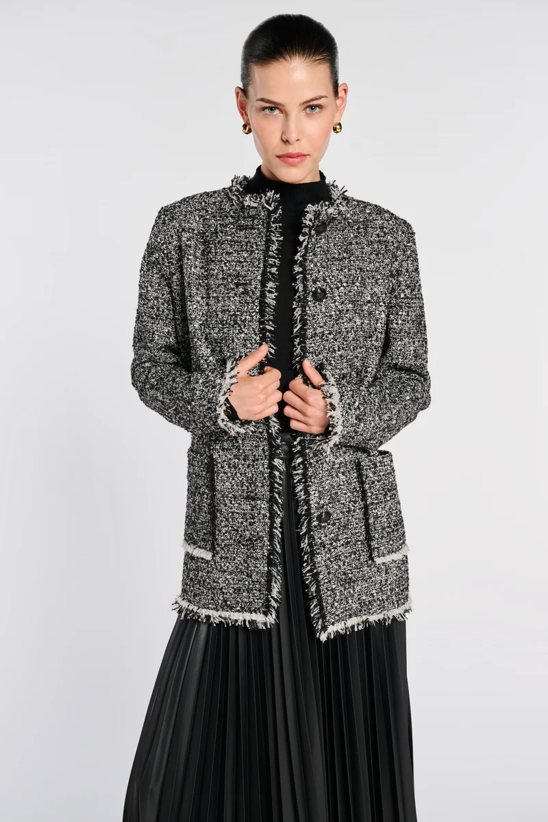 Veste longue en tweed frangée