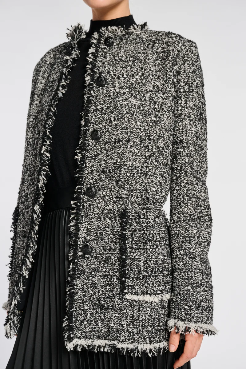 Veste longue en tweed frangée